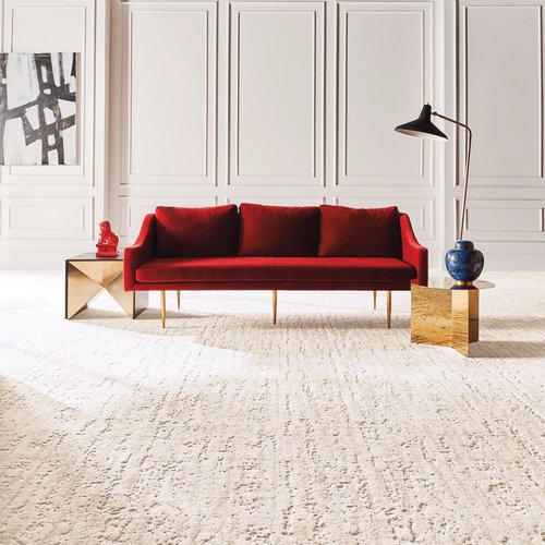 Red couch on the carpet - Nantahala Flooring Outlet in Franklin